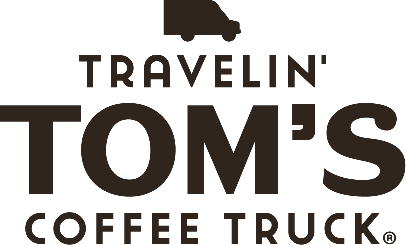 travelin toms logo brown 2026